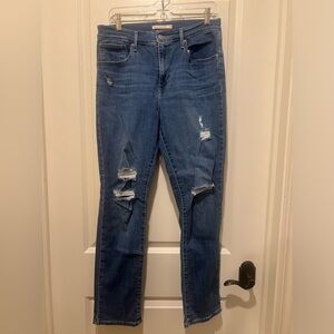 Levi's Straight Leg Jeans with Distressed Details Ripped Blue Jeans